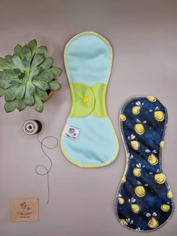 Serviette hygiénique lavable nuit Luciolle – protection menstruelle réutilisable et absorbante, fabriquée en Suisse par La Fabrik a Patate.