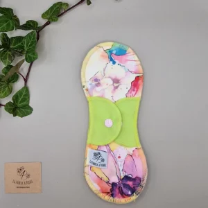 Serviette hygiénique lavable cattleya – protection menstruelle réutilisable et absorbante, fabriquée en Suisse par La Fabrik a Patate.